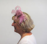 Rose bow fascinator with feathers