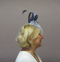 Crinoline fascinator with roses and feathers