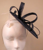 Disc with ribbons and swirl fascinator