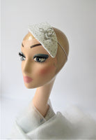 Ivory bridal headpiece with diamante and brooch