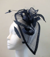 Long teardrop fascinator with leaves and ribbon with bead seeds