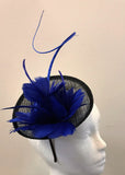 Small saucer fascinator with feather flowers and spine