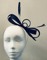 Bow fascinator with Dalmonte and feathers