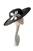 Black and silver upturned brim hatinator with silver leaver leaves and broach detail