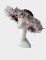 Beautiful wine hat with white band and feather trim