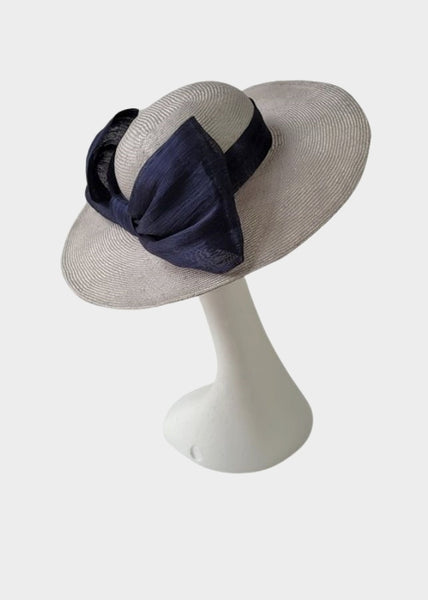 Beautiful Parasisal hat with silk abaca hat band and bow