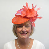 Saucer fascinator with feather flowers and crinoline